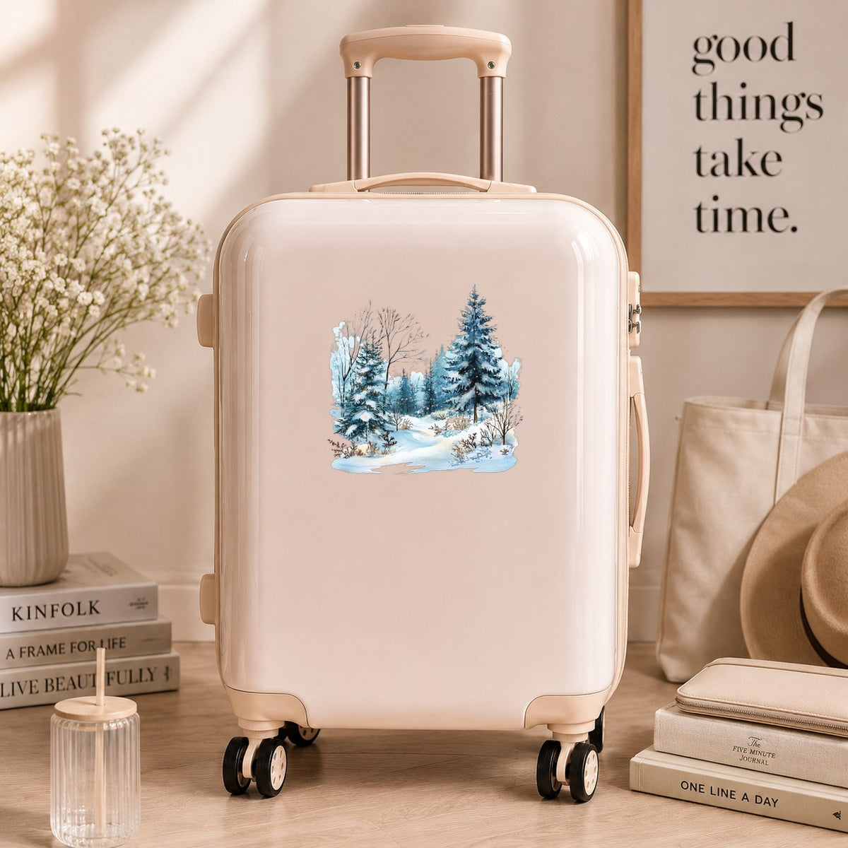 Snowy Pine Forest UV DTF sticker applied to a neutral suitcase