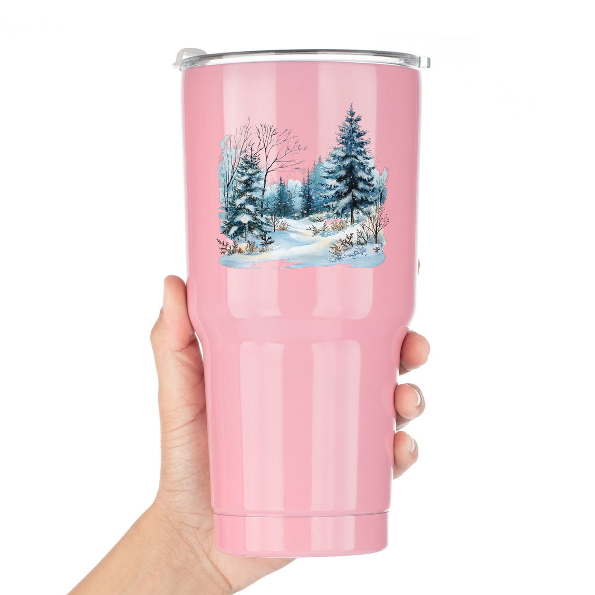 Snowy Pine Forest UV DTF sticker applied to a pink tumbler