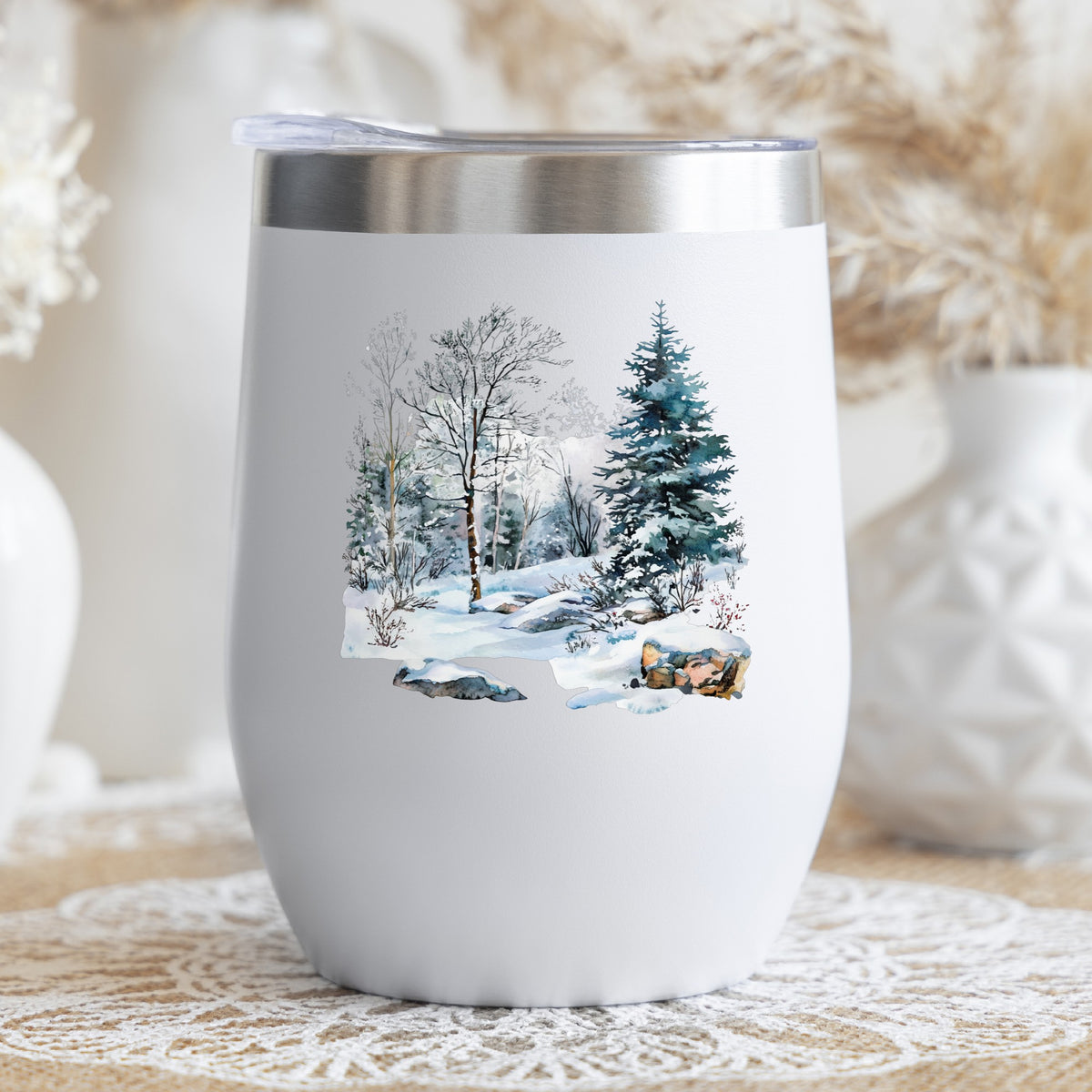 Birch And Spruce Winter Forest UV DTF sticker applied to a stemless wine glass