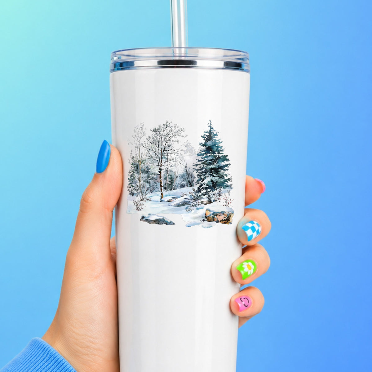 Birch And Spruce Winter Forest UV DTF sticker applied to a white tumbler