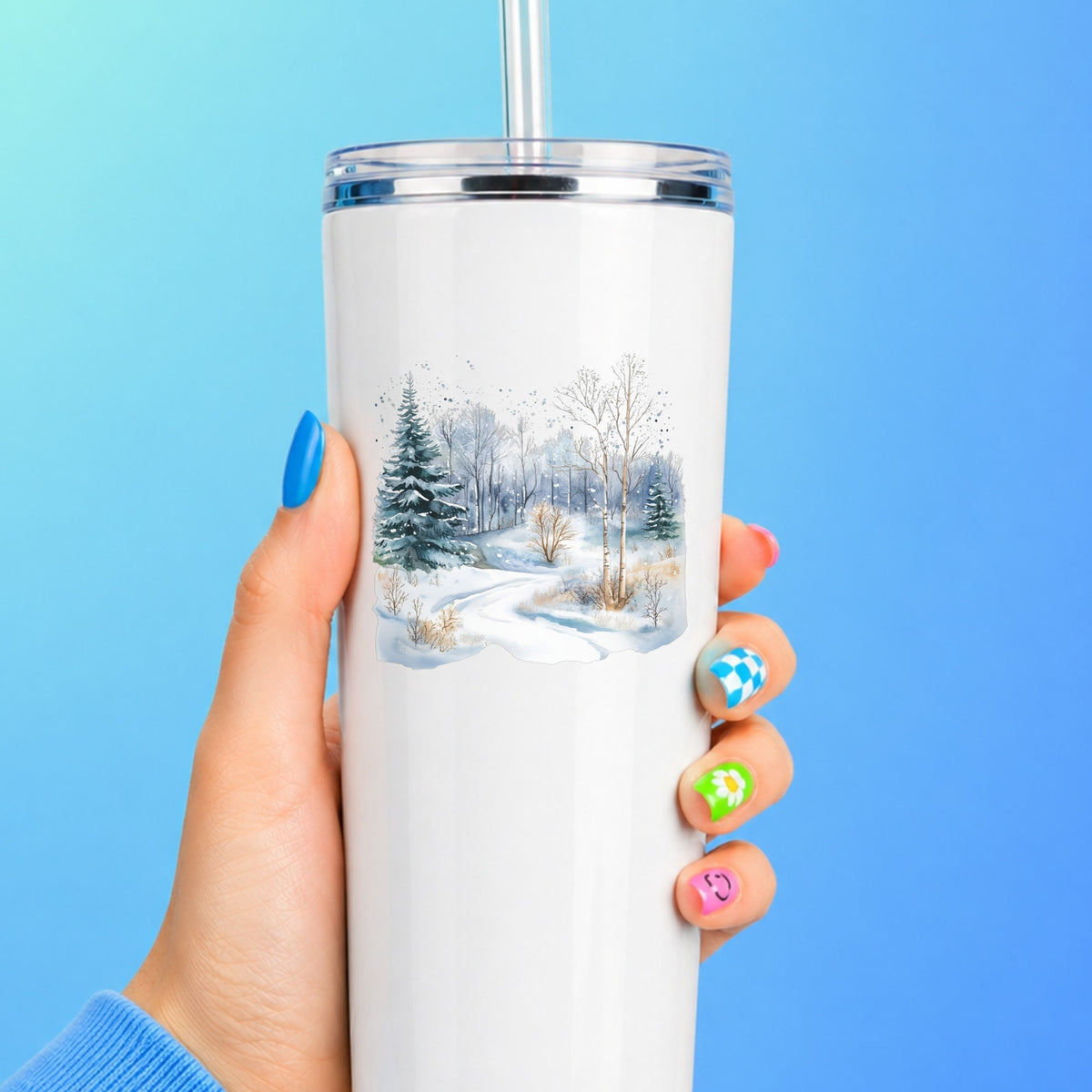 Snowy Forest Path UV DTF sticker applied to a white tumbler