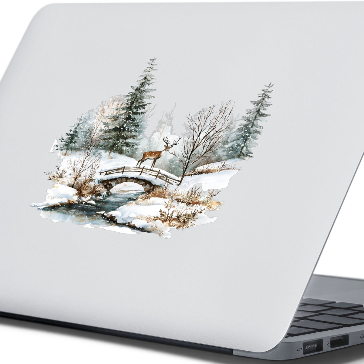 Deer On Stone Bridge UV DTF sticker applied to a laptop