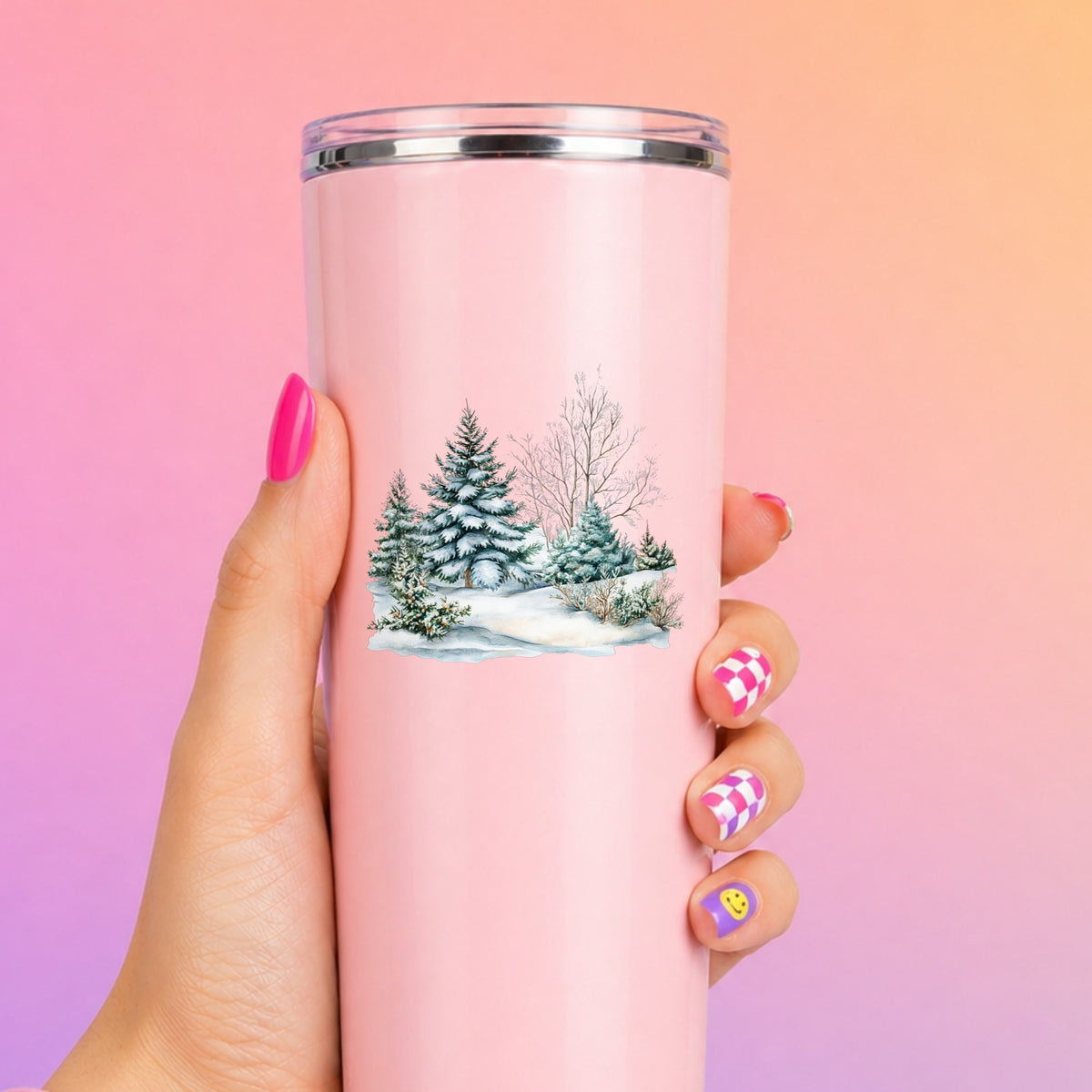 Snow Covered Spruce Trees UV DTF sticker applied to a pink tumbler