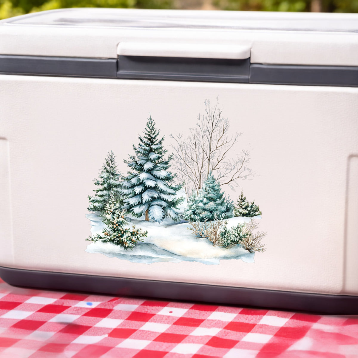 Snow Covered Spruce Trees UV DTF sticker applied to a white cooler