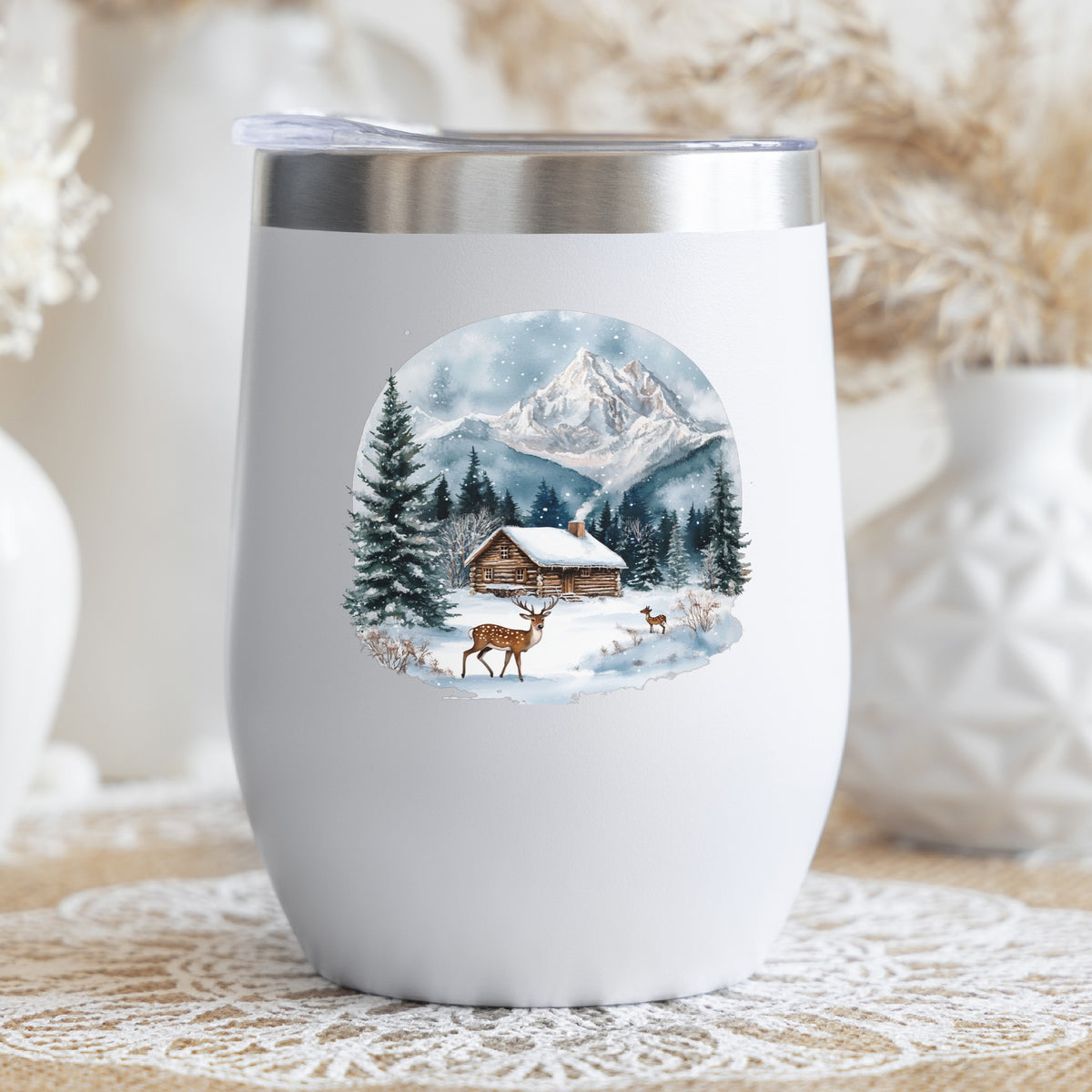 Log Cabin And Deer UV DTF sticker applied to a stemless wine glass