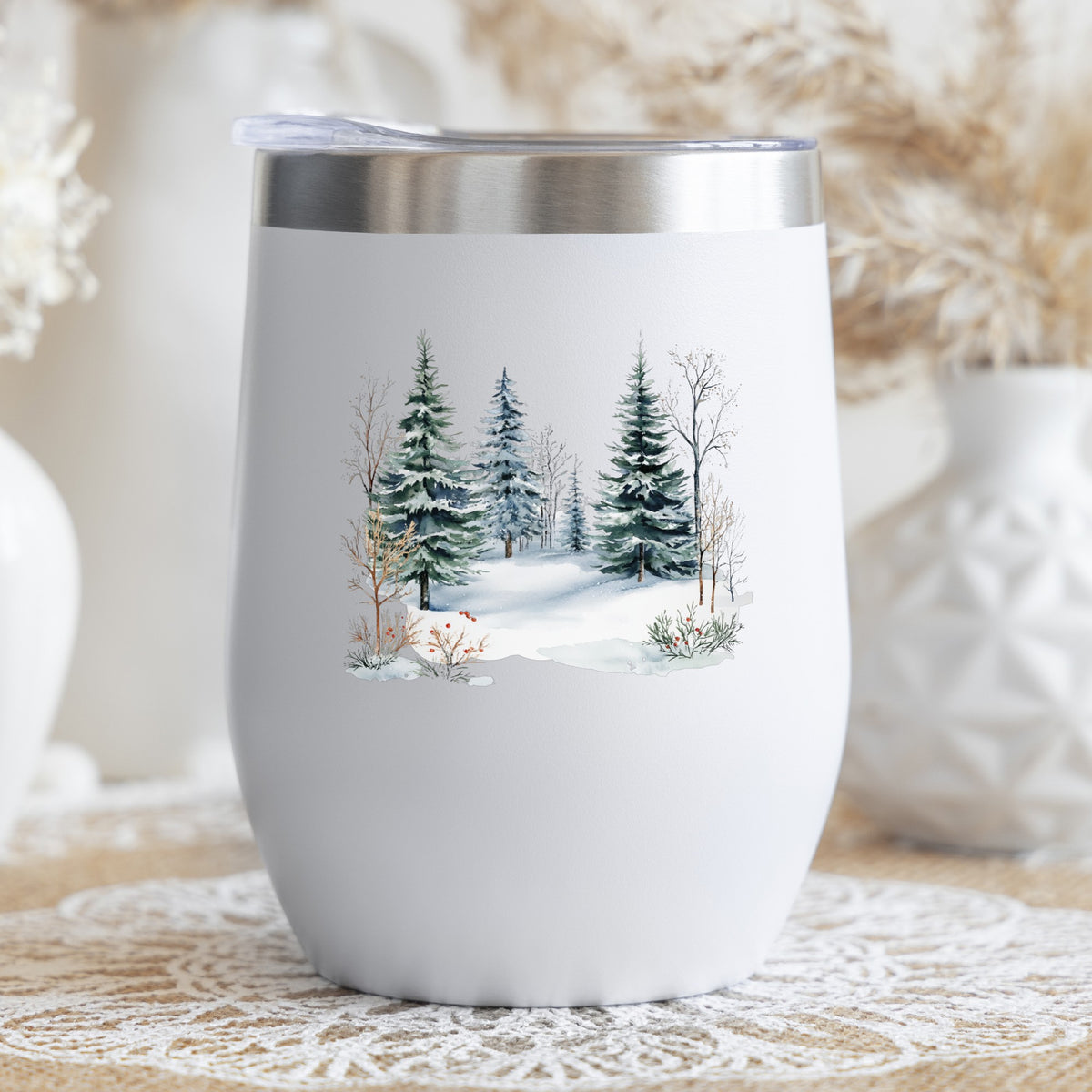Winter Evergreens With Red Berries UV DTF sticker applied to a stemless wine glass