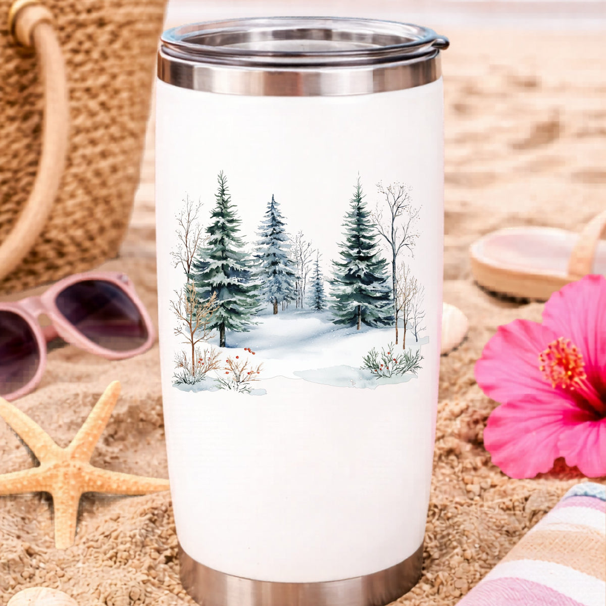 Winter Evergreens With Red Berries UV DTF sticker applied to a water bottle at the beach