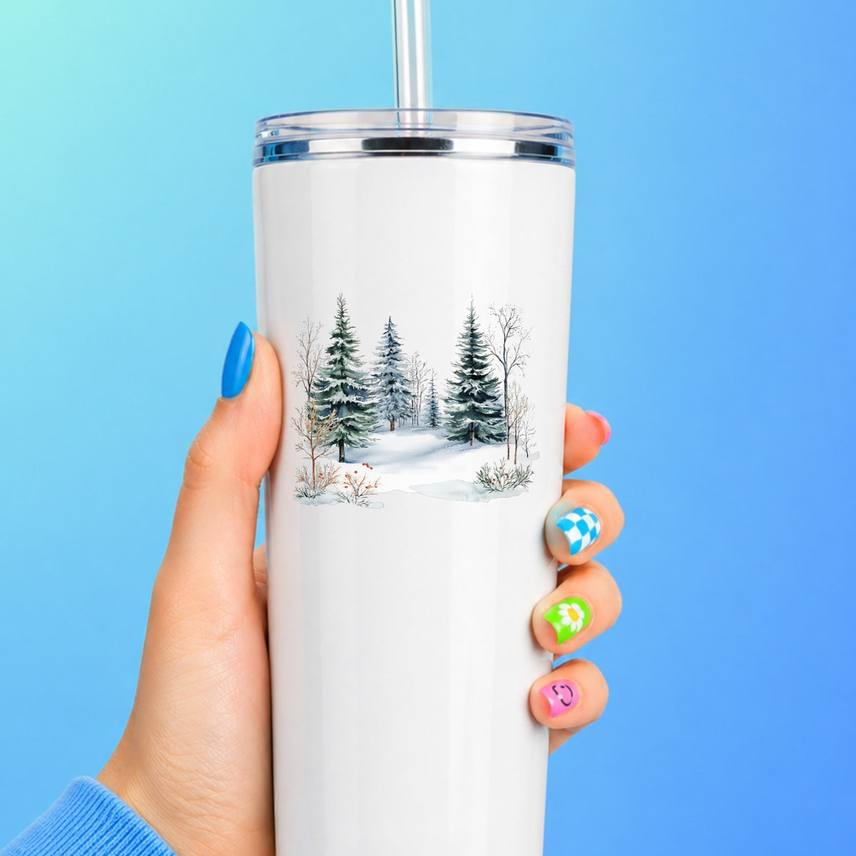 Winter Evergreens With Red Berries UV DTF sticker applied to a white tumbler