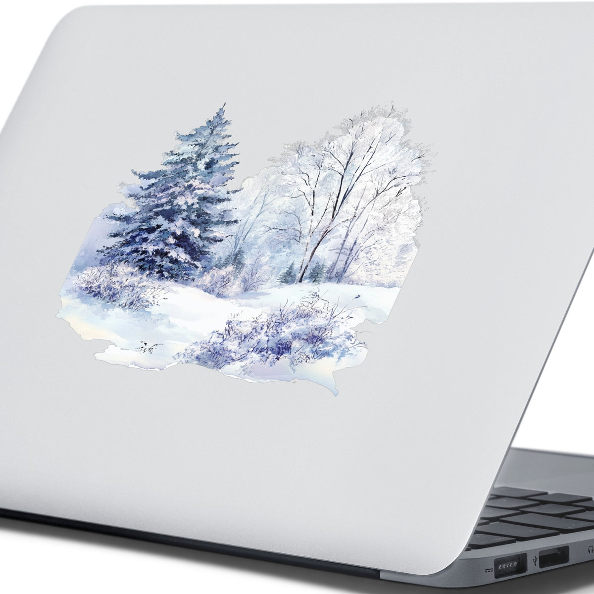 Purple Winter Forest UV DTF sticker applied to a laptop