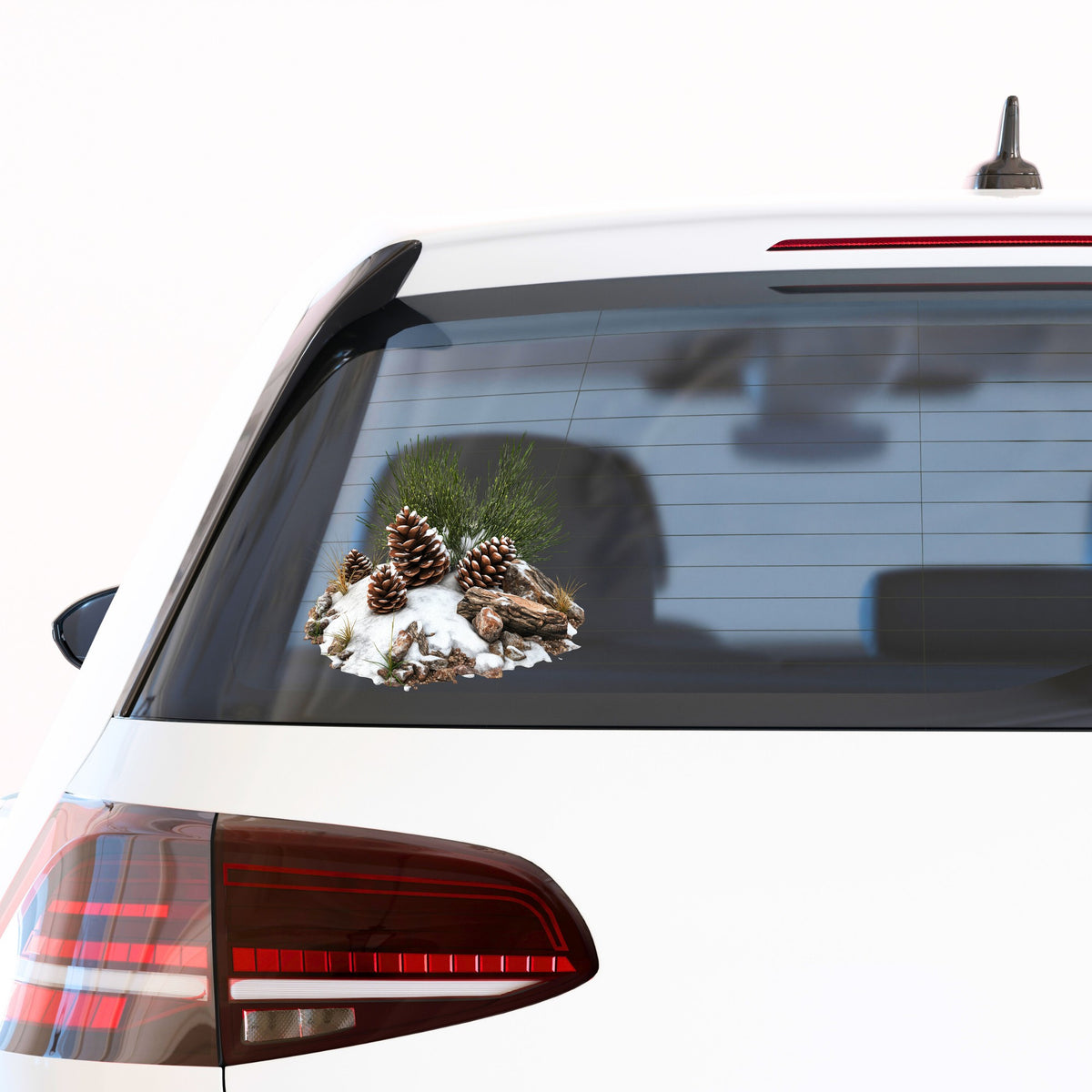 Pine Cones In Snow UV DTF sticker applied to a car window