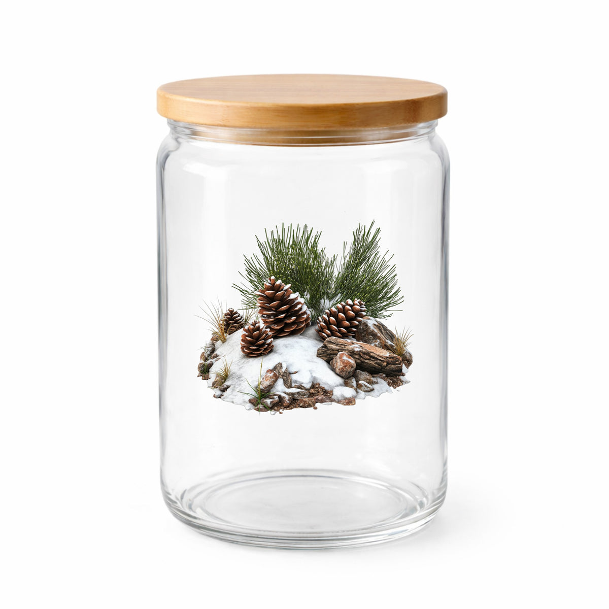 Pine Cones In Snow UV DTF sticker applied to a clear glass jar with lid