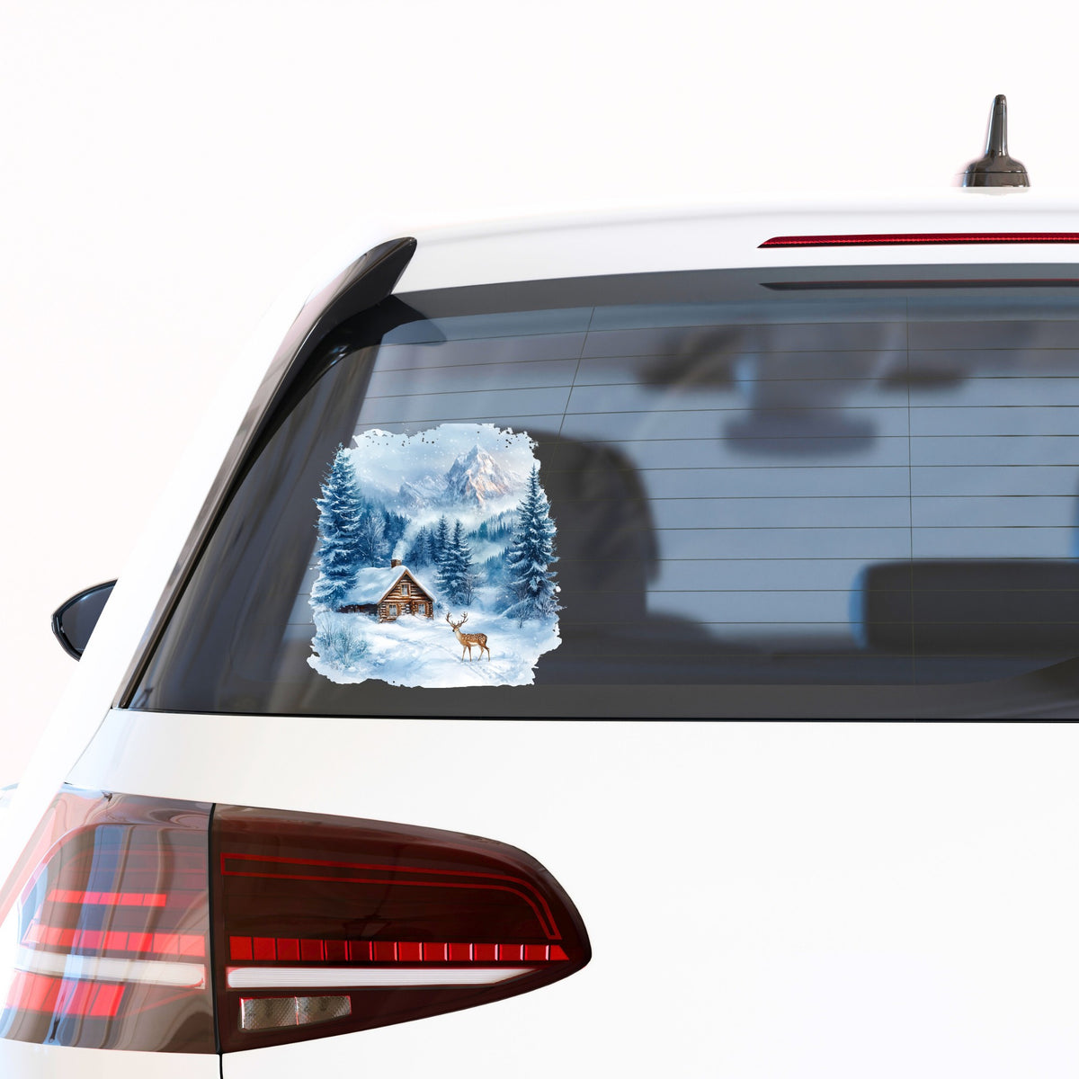 Blue Winter Cabin With Deer UV DTF sticker applied to a car window