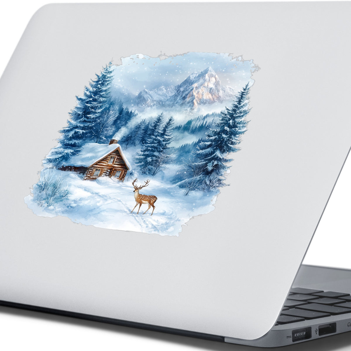 Blue Winter Cabin With Deer UV DTF sticker applied to a laptop