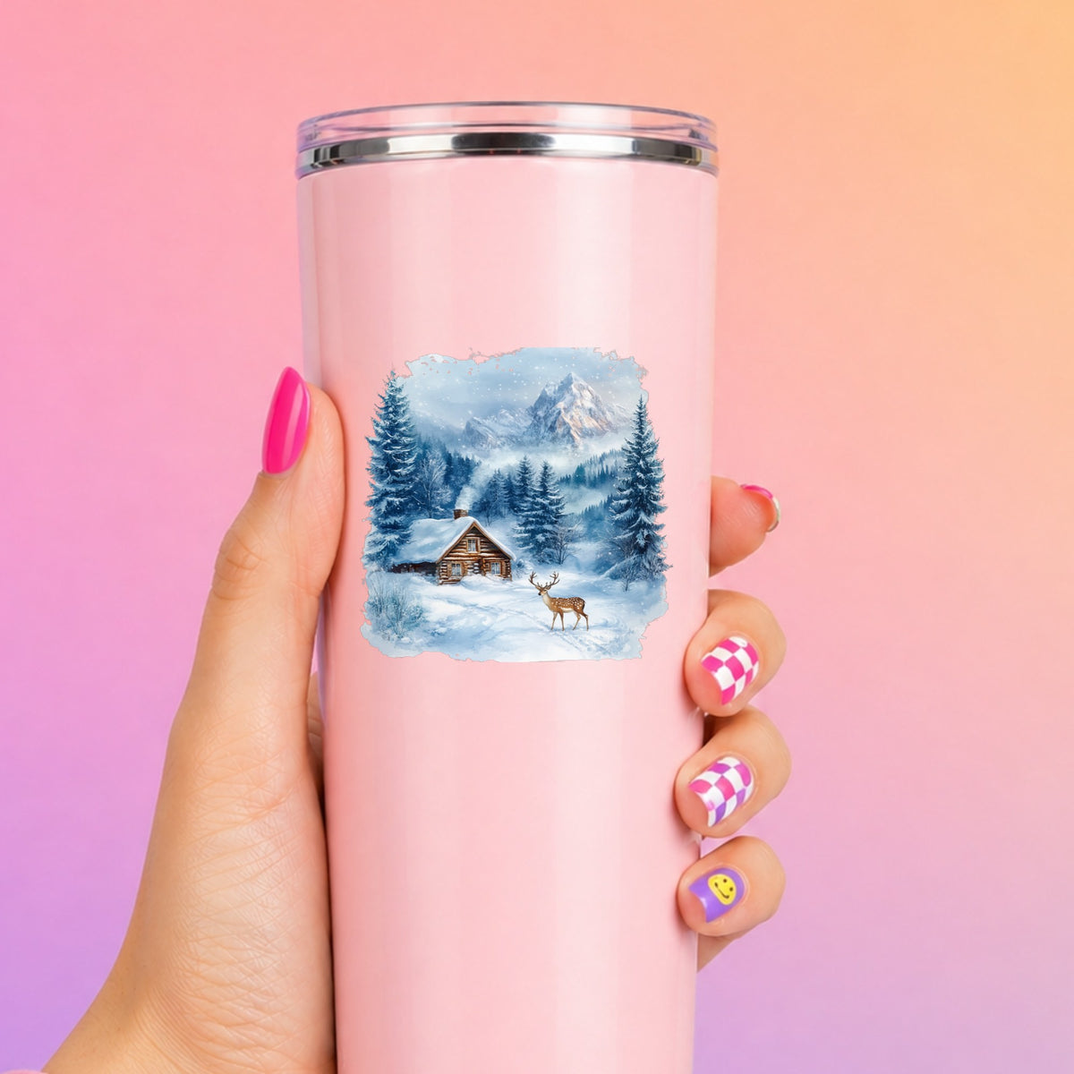 Blue Winter Cabin With Deer UV DTF sticker applied to a pink tumbler