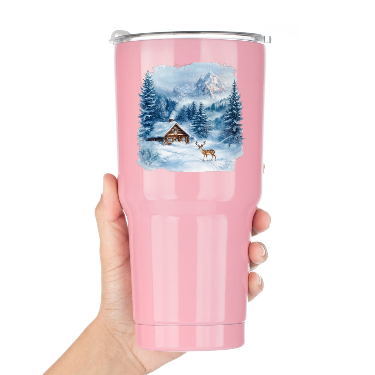 Blue Winter Cabin With Deer UV DTF sticker applied to a pink tumbler