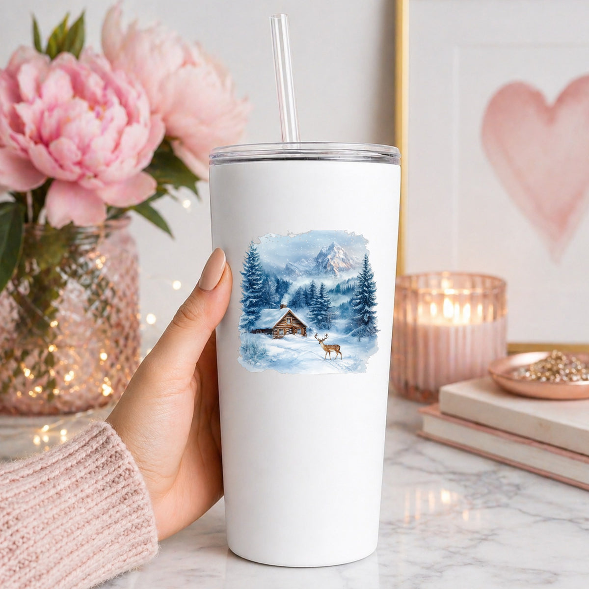 Blue Winter Cabin With Deer UV DTF sticker applied to a white tumbler