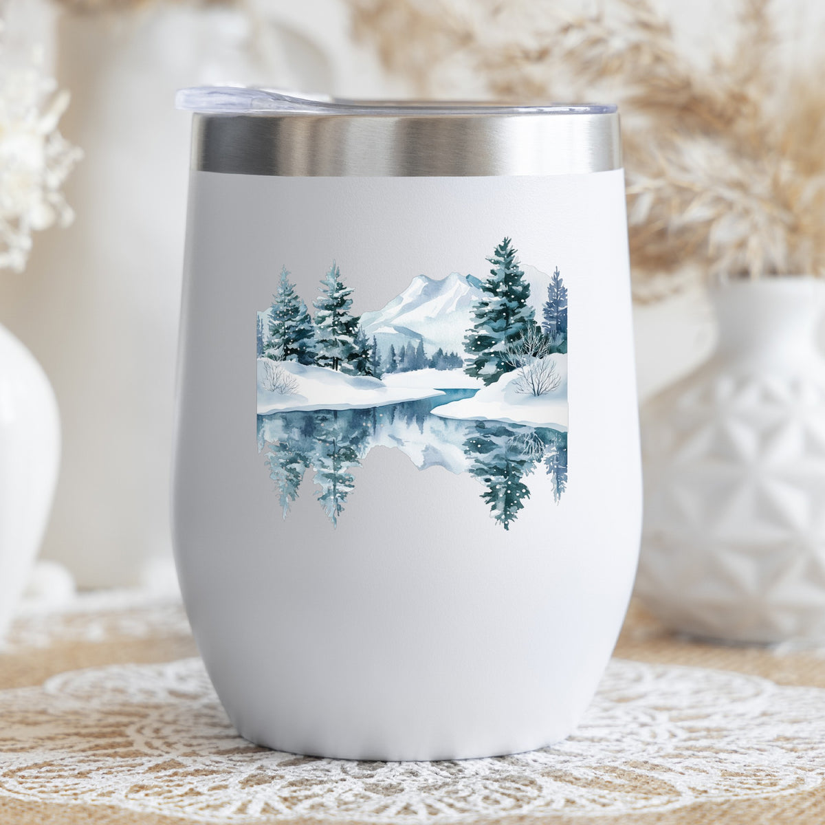 Winter Lake Reflection UV DTF sticker applied to a stemless wine glass