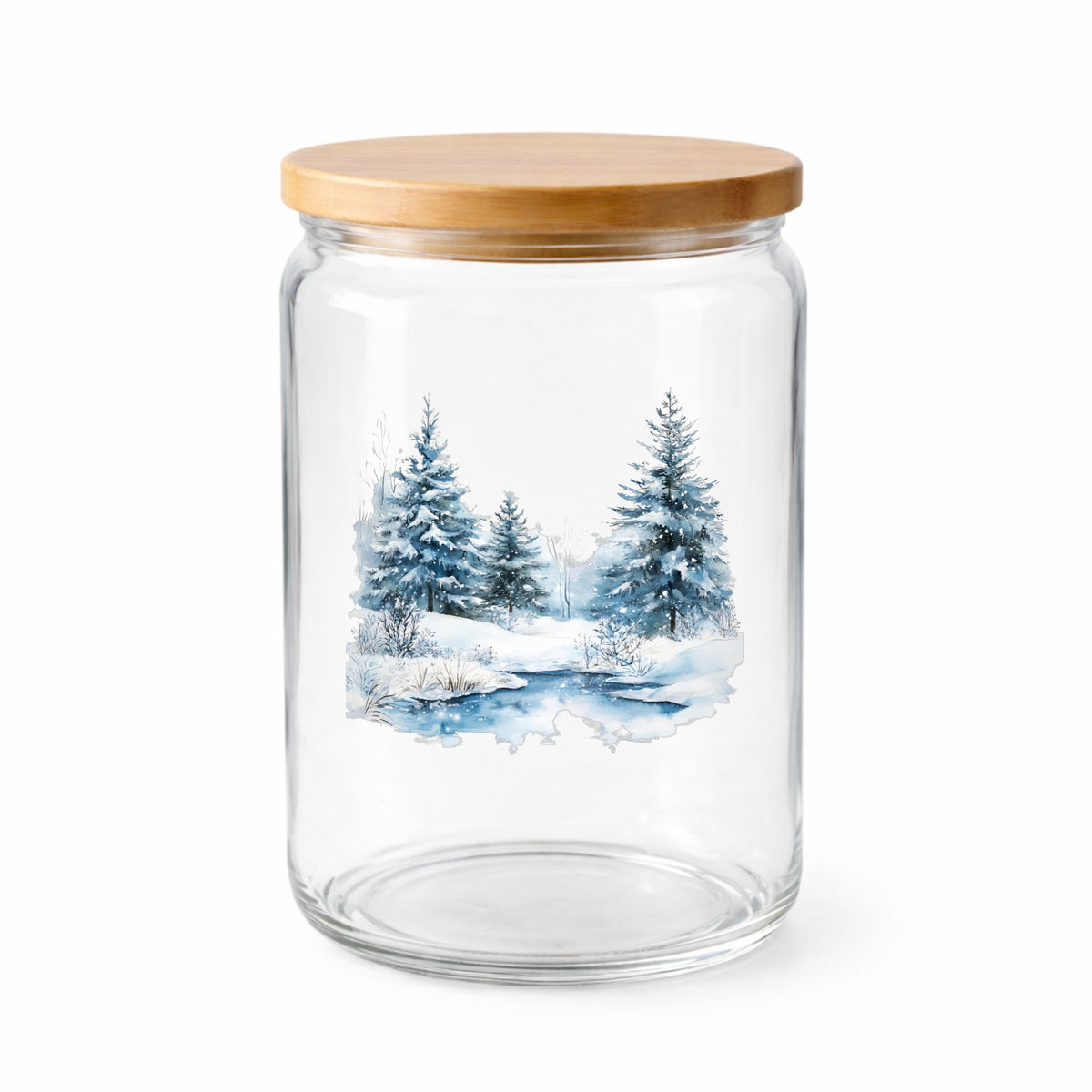 Snowy Evergreens By Stream UV DTF sticker applied to a clear glass jar with lid