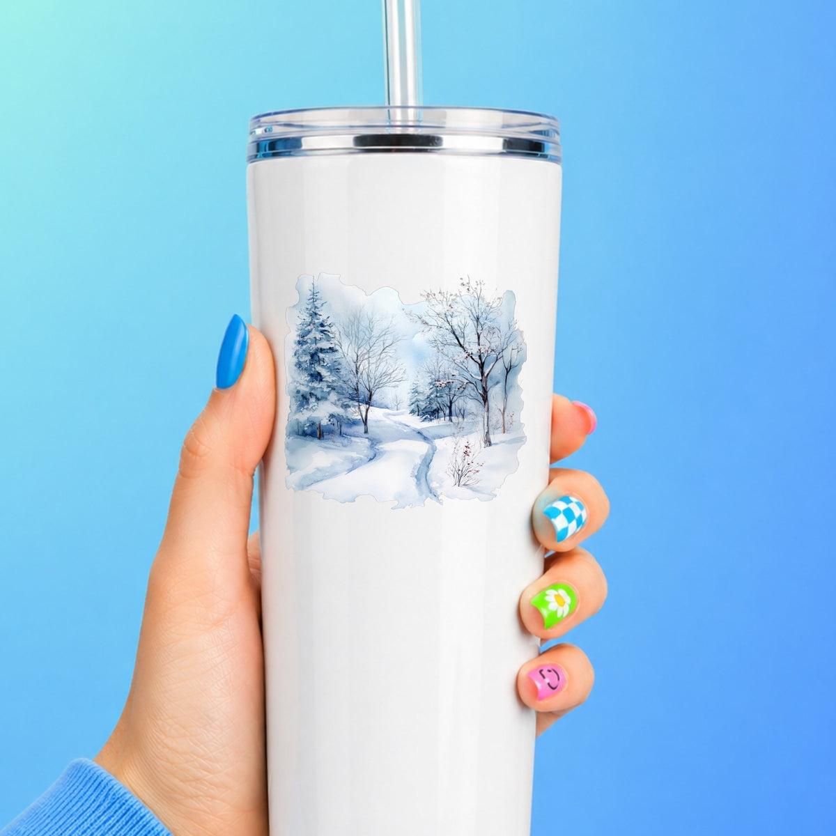 Winter Snow Path UV DTF sticker applied to a white tumbler