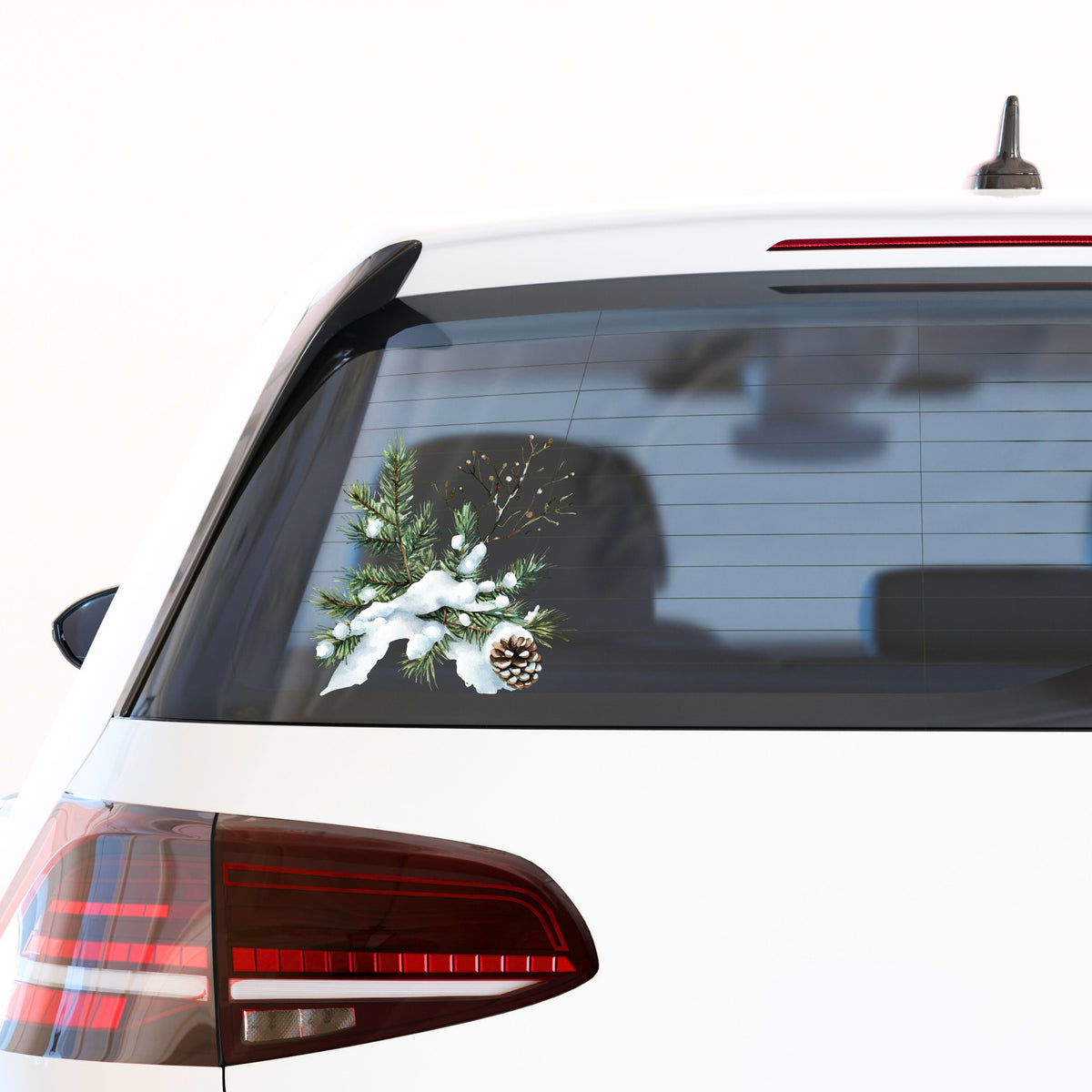Snowy Pine Branch With Pine Cone UV DTF sticker applied to a car window