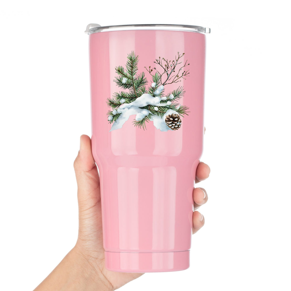 Snowy Pine Branch With Pine Cone UV DTF sticker applied to a pink tumbler
