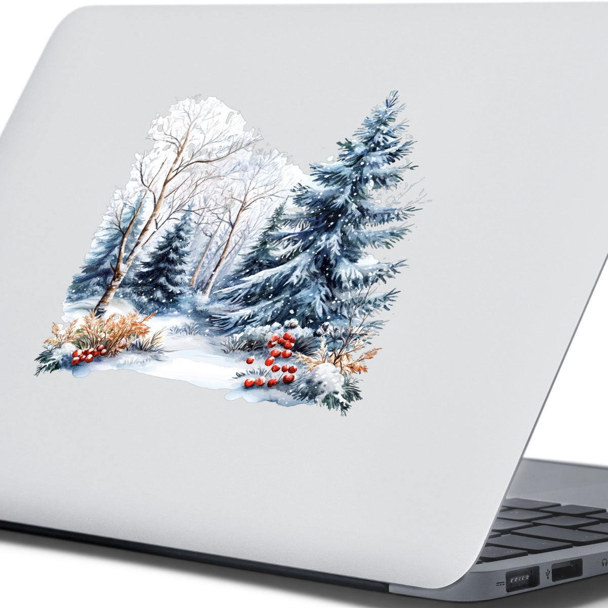 Blue Spruce Winter Forest UV DTF sticker applied to a laptop