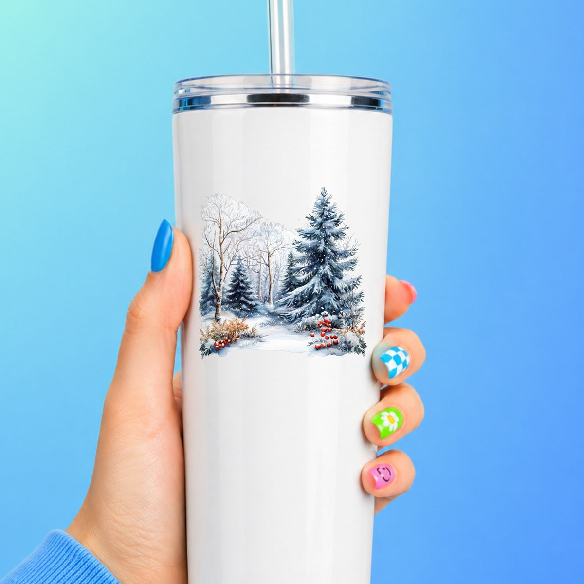 Blue Spruce Winter Forest UV DTF sticker applied to a white tumbler