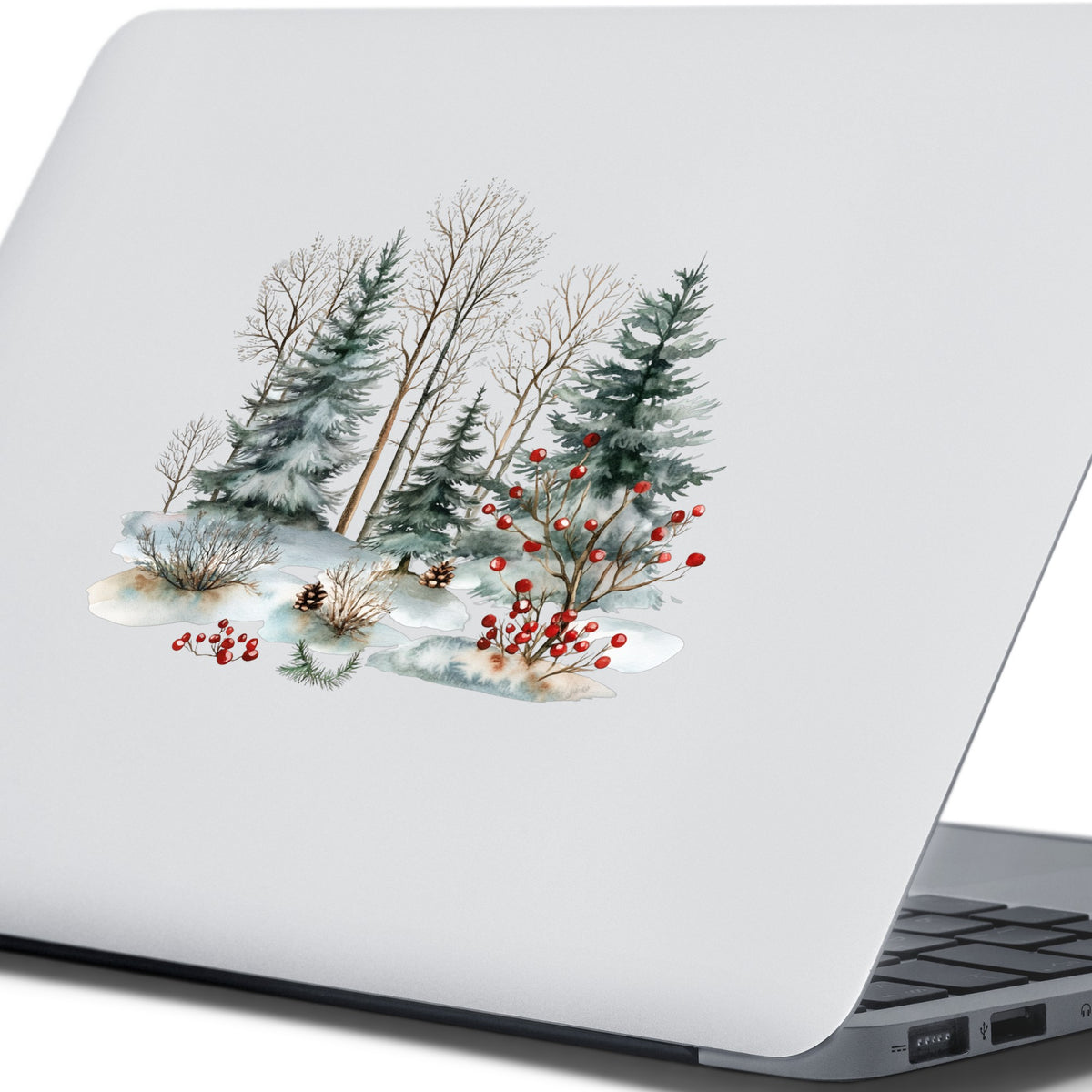 Red Berry Winter Woodland UV DTF sticker applied to a laptop