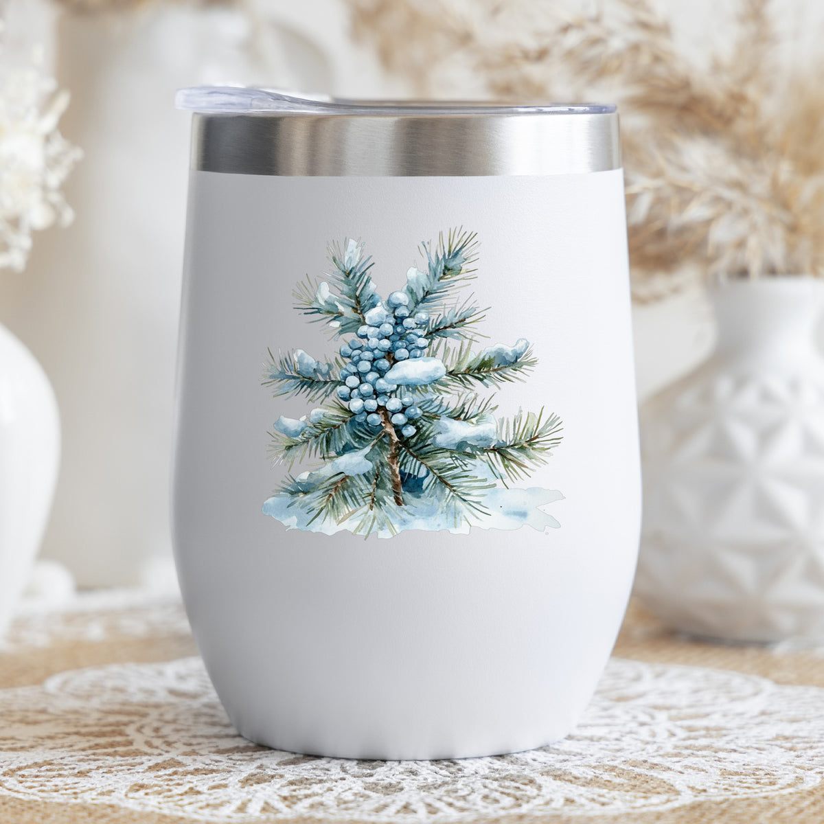 Juniper Berry Branch UV DTF sticker applied to a stemless wine glass