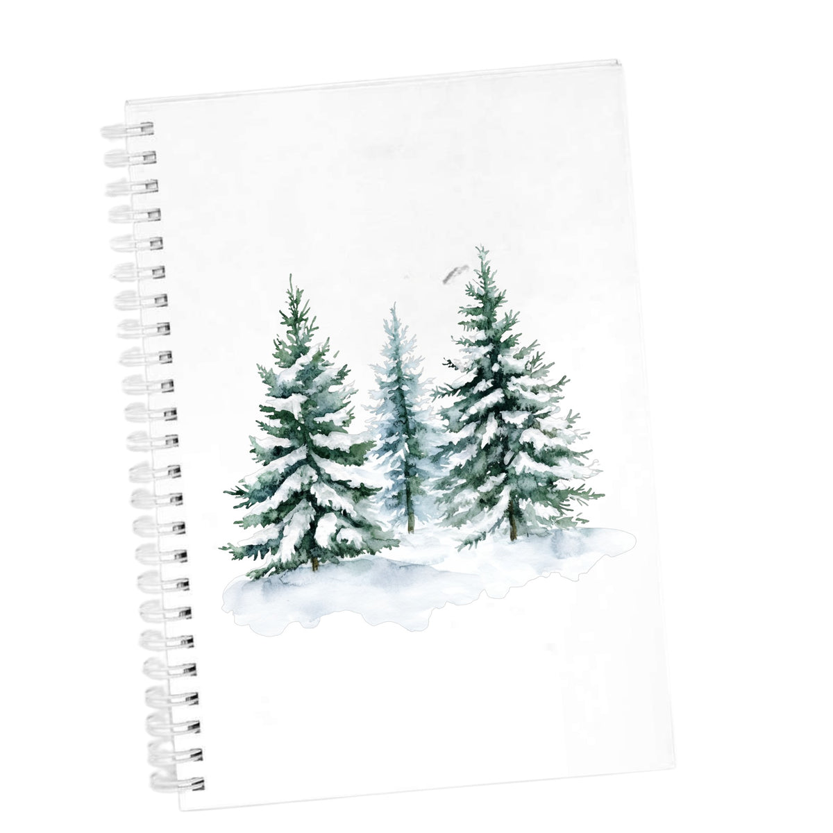 Three Snowy Pine Trees UV DTF sticker applied to a white journal