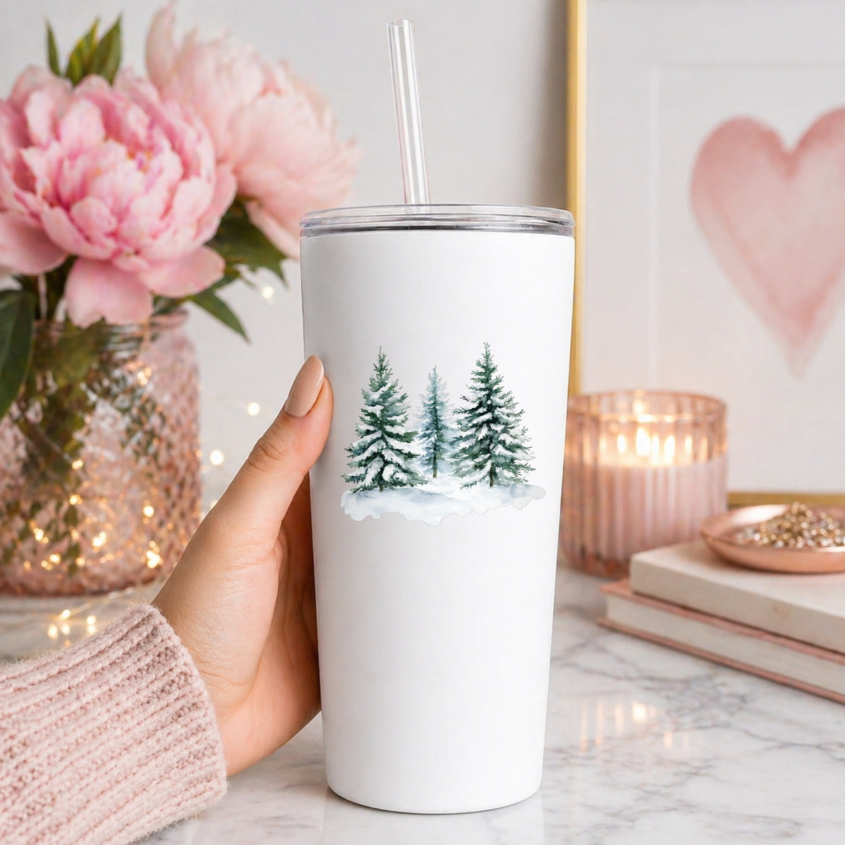 Three Snowy Pine Trees UV DTF sticker applied to a white tumbler