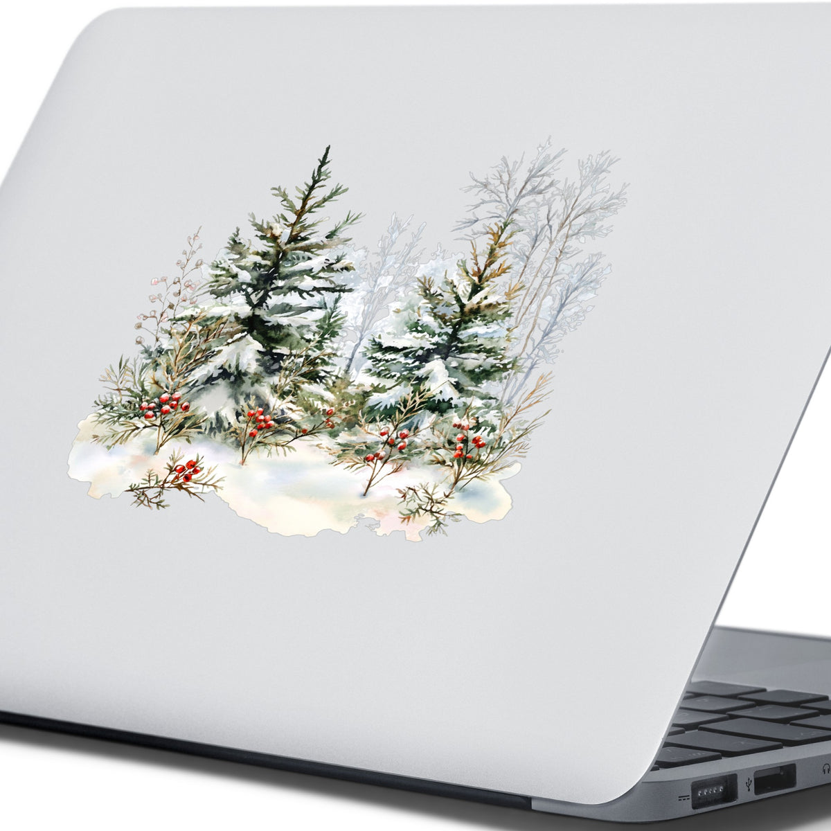 Winter Pine Trees With Berries UV DTF sticker applied to a laptop