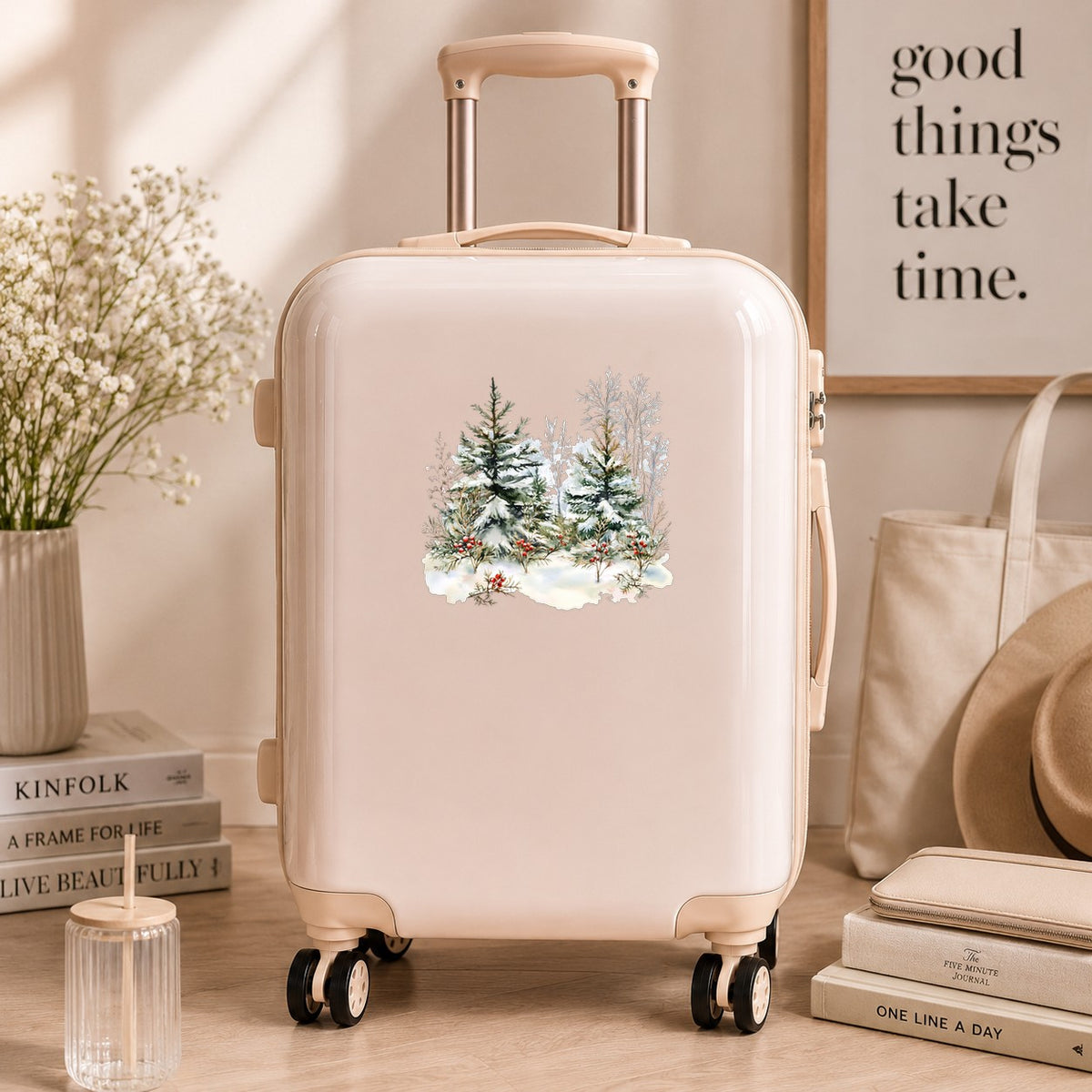 Winter Pine Trees With Berries UV DTF sticker applied to a neutral suitcase