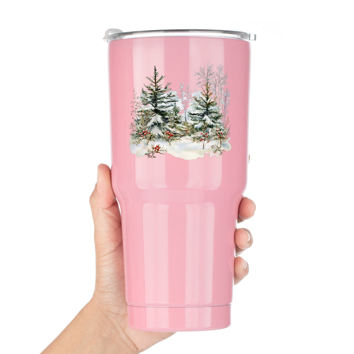 Winter Pine Trees With Berries UV DTF sticker applied to a pink tumbler