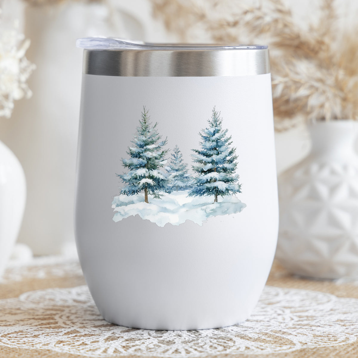 Two Blue Spruce Trees UV DTF sticker applied to a stemless wine glass