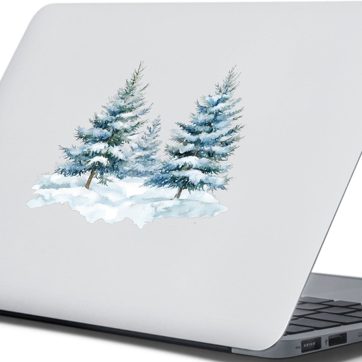 Two Blue Spruce Trees UV DTF sticker applied to a laptop