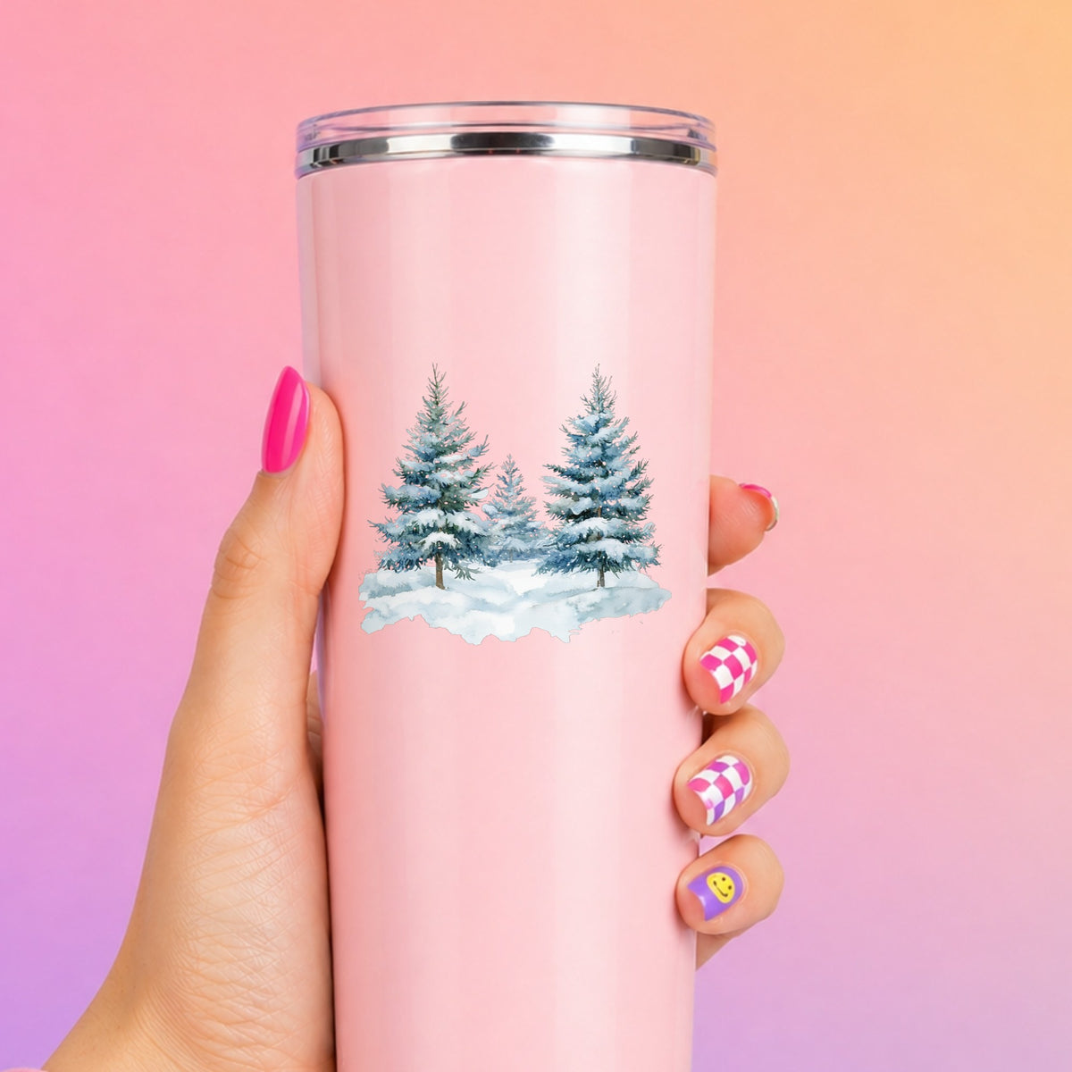 Two Blue Spruce Trees UV DTF sticker applied to a pink tumbler