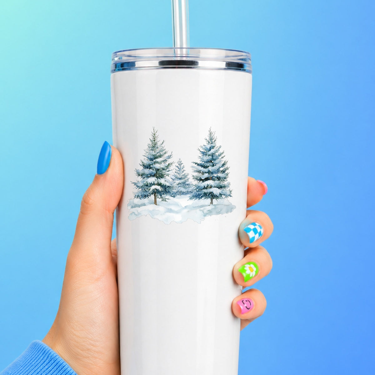 Two Blue Spruce Trees UV DTF sticker applied to a white tumbler