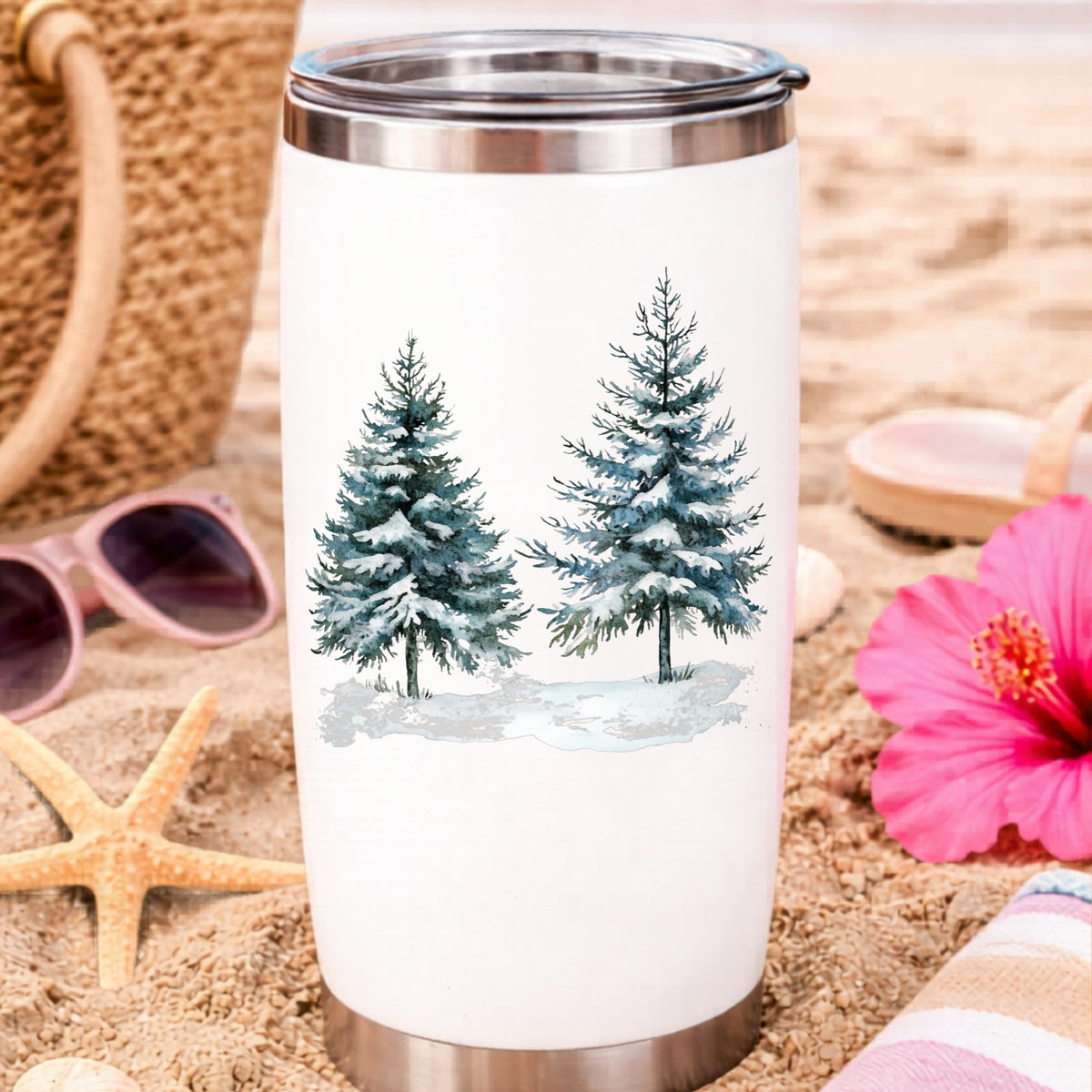 Snowy Evergreen Pair UV DTF sticker applied to a water bottle at the beach