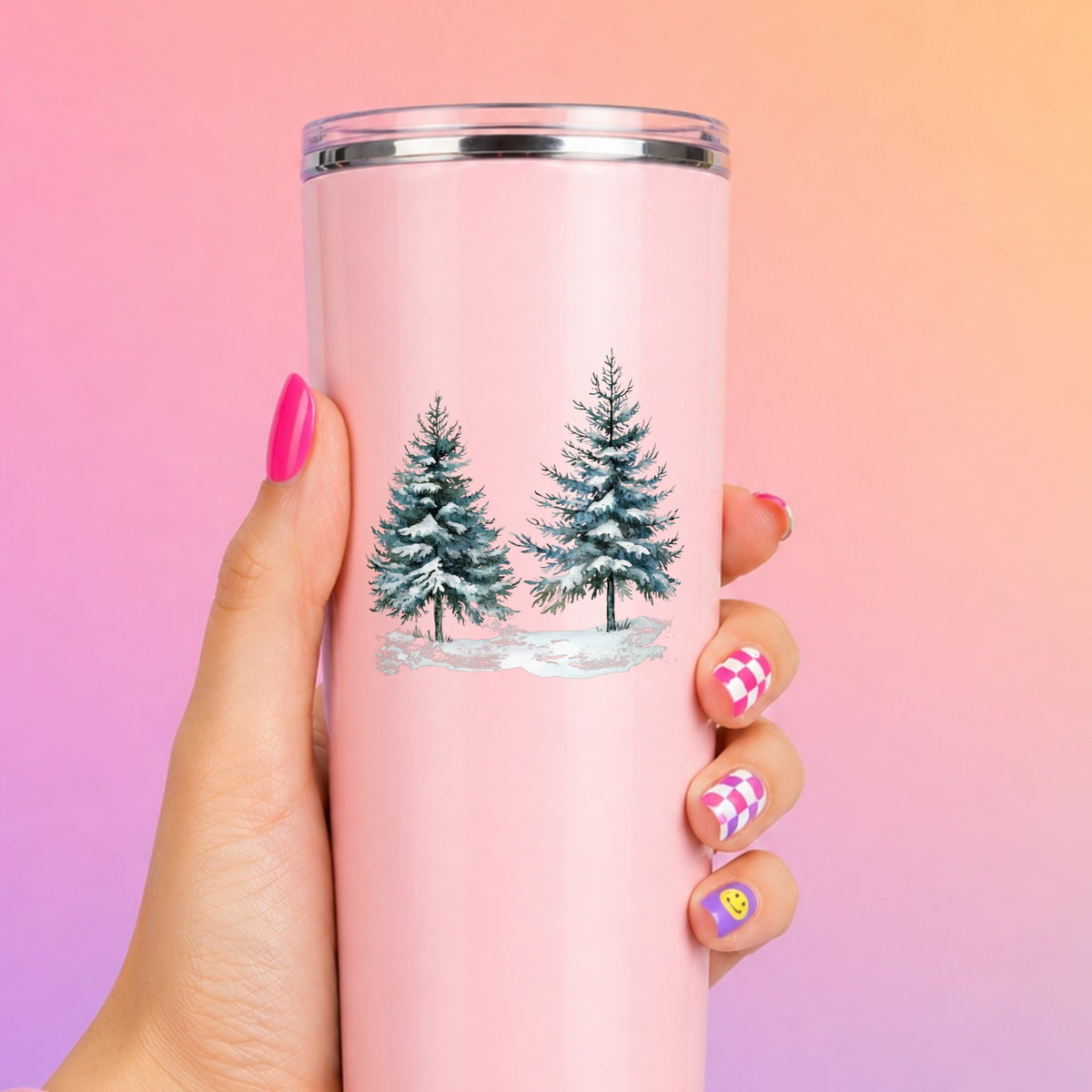 Snowy Evergreen Pair UV DTF sticker applied to a pink tumbler
