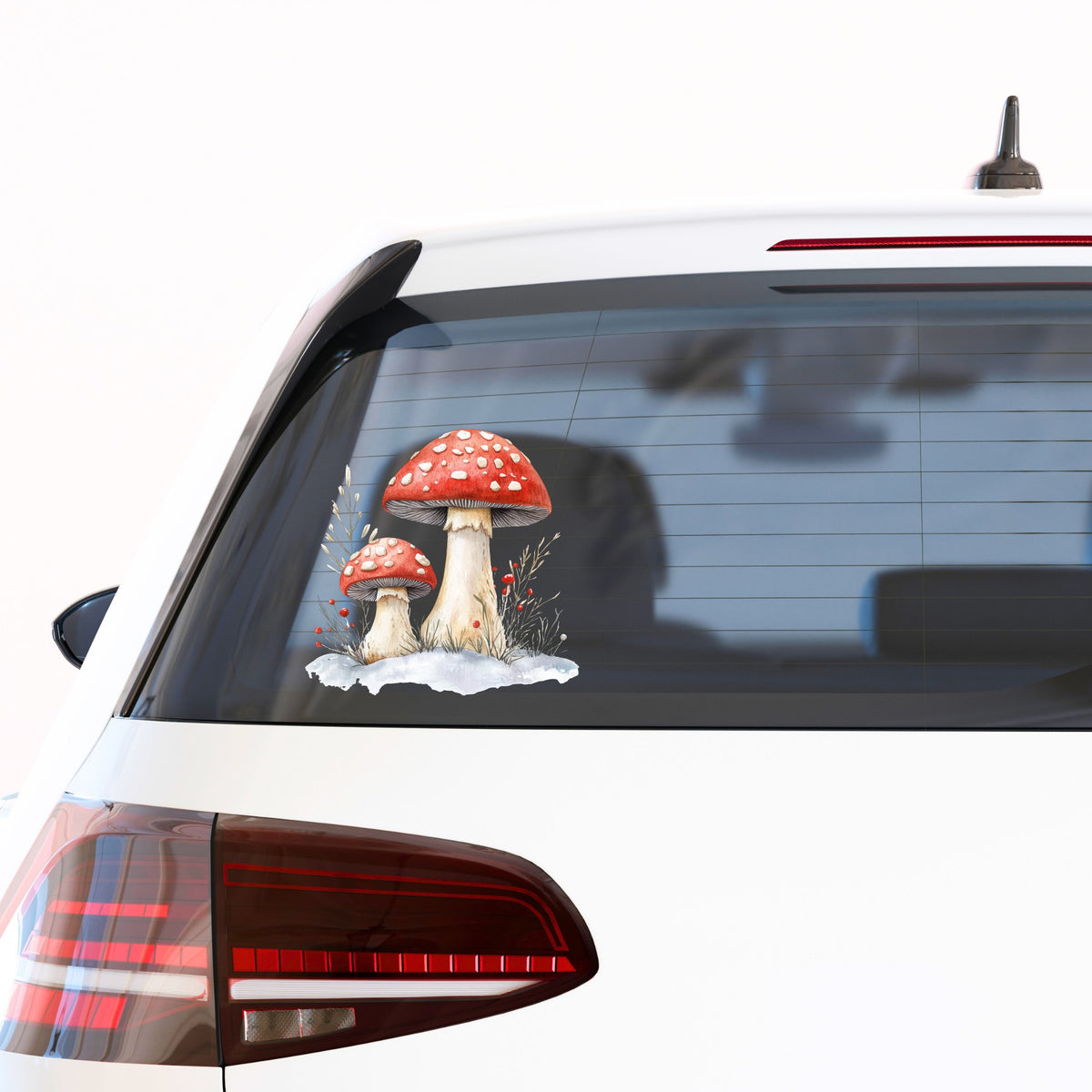 Red Mushrooms In Snow UV DTF sticker applied to a car window