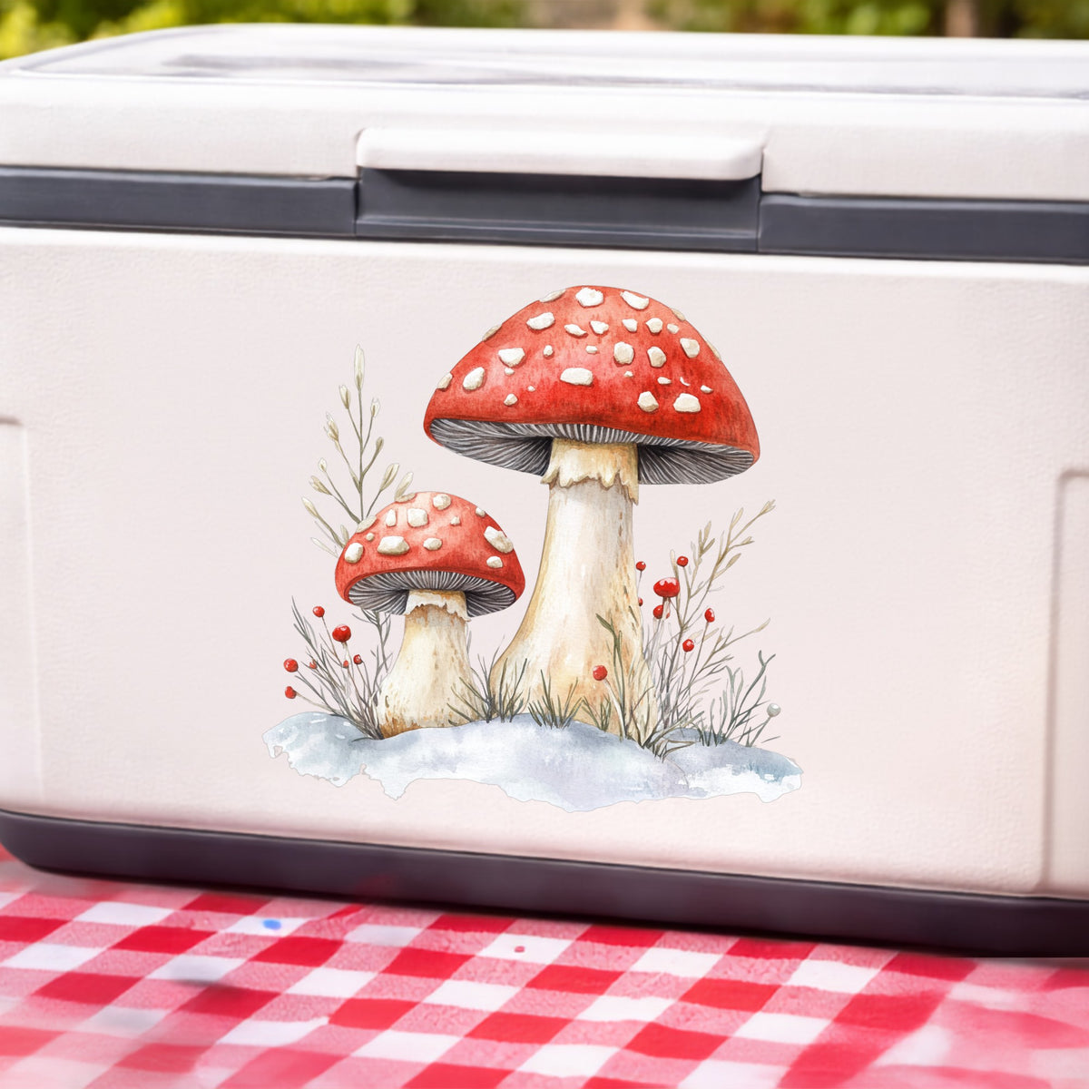 Red Mushrooms In Snow UV DTF sticker applied to a white cooler