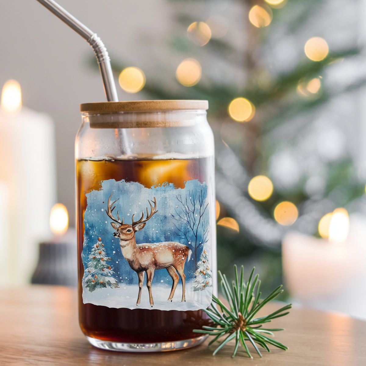 Christmas Deer With Decorated Trees UV DTF sticker applied to a glass can cup
