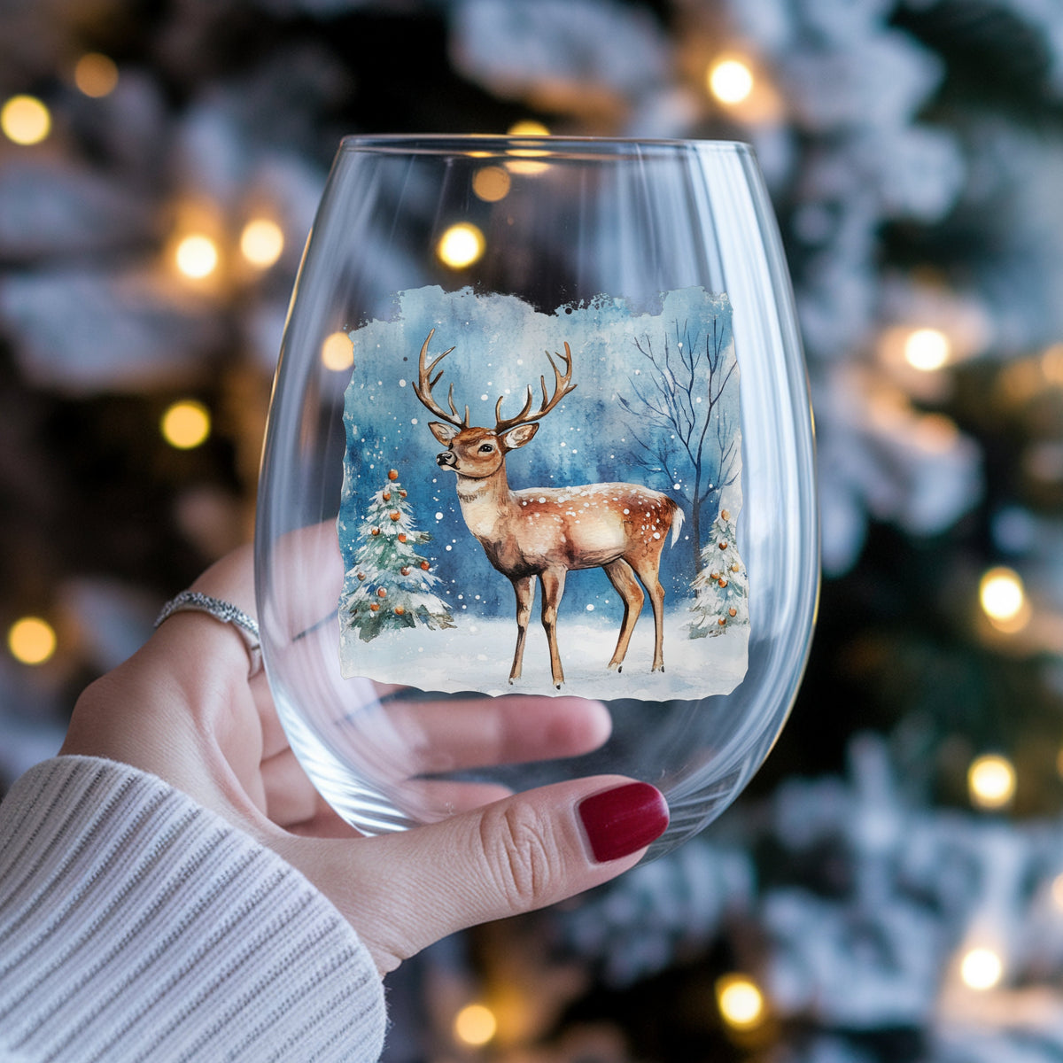 Christmas Deer With Decorated Trees UV DTF sticker applied to a wine glass