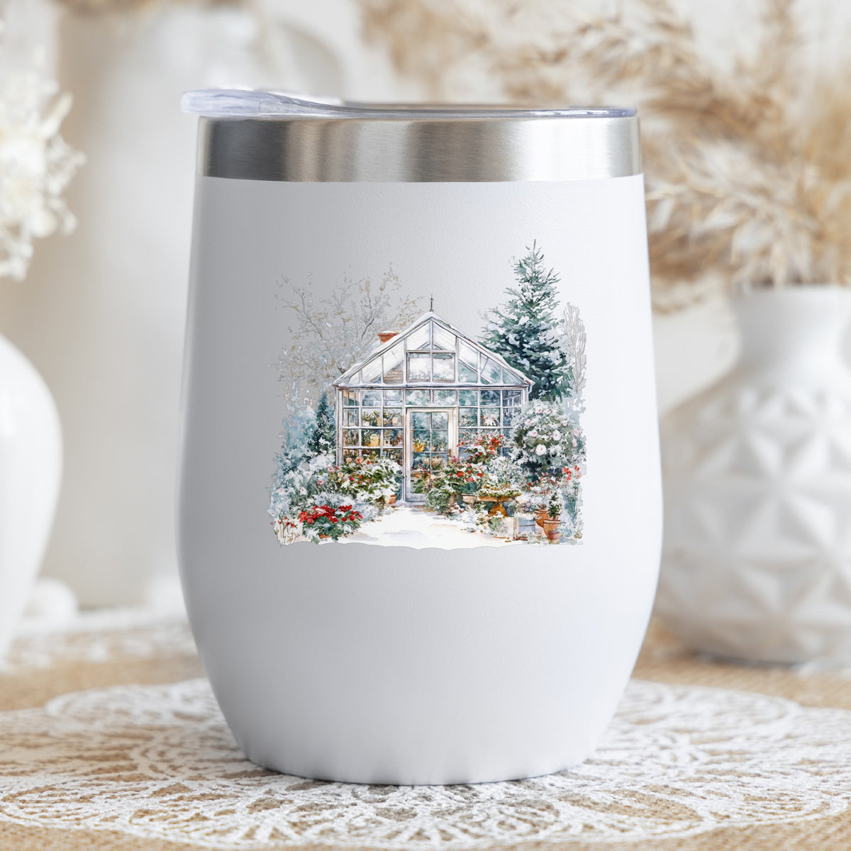 Snowy Greenhouse UV DTF sticker applied to a stemless wine glass