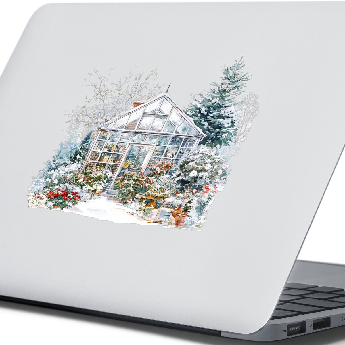 Snowy Greenhouse UV DTF sticker applied to a laptop