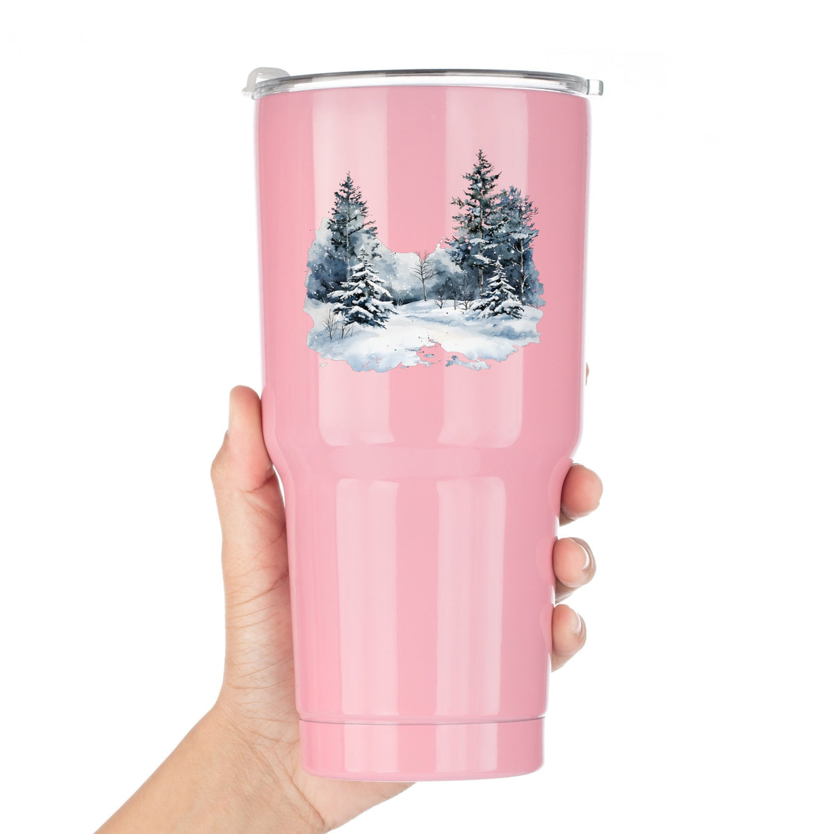 Falling Snow Pine Forest UV DTF sticker applied to a pink tumbler
