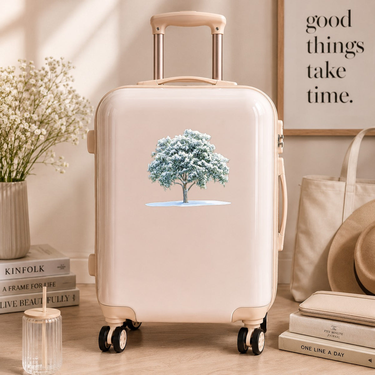 Snow Covered Tree UV DTF sticker applied to a neutral suitcase