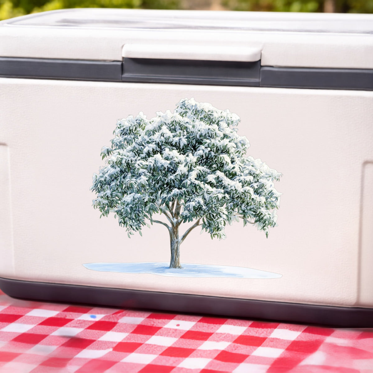 Snow Covered Tree UV DTF sticker applied to a white cooler