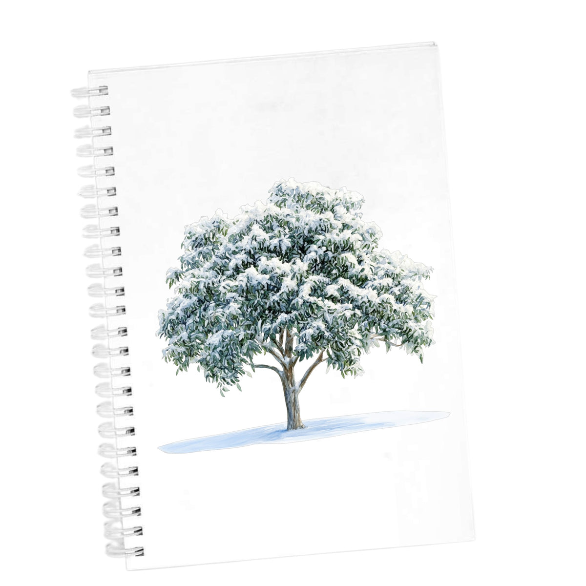 Snow Covered Tree UV DTF sticker applied to a white journal